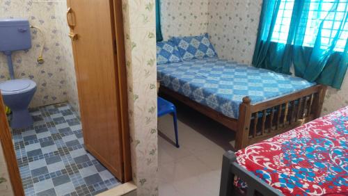 a small room with a bed and a toilet at Happy Tourist Home and Dormitory Neyyardam in Parattipalli