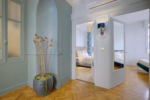 Ένα ή περισσότερα κρεβάτια σε δωμάτιο στο Luxury apartment in City Center of Nice