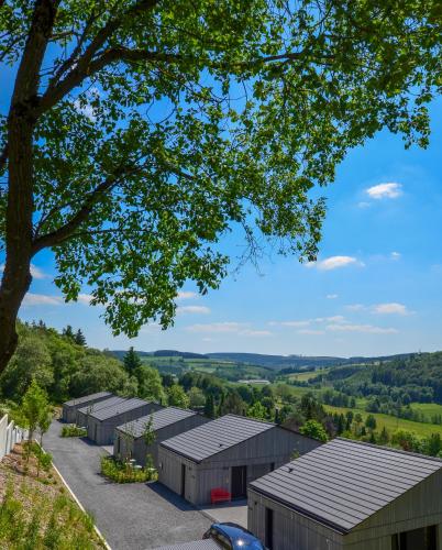 an overhead view of a row of metal buildings at Sauerland Lodge - Haus Julius in Winterberg