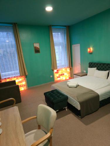 Fantastico Exlcusive Hotelにあるベッド