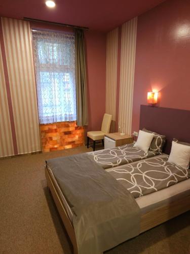 Fantastico Exlcusive Hotelにあるベッド