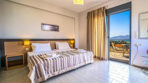 Postel nebo postele na pokoji v ubytování Anemon Villas