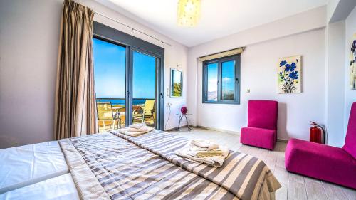 Postel nebo postele na pokoji v ubytování Anemon Villas