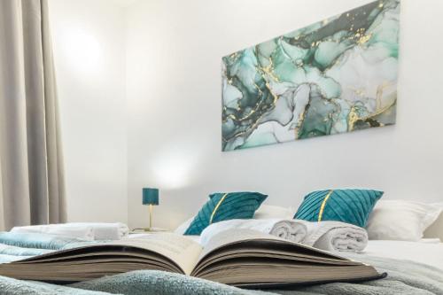 Letto o letti in una camera di Exclusive Roth Apartments