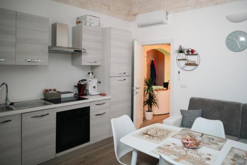 Kuchyň nebo kuchyňský kout v ubytování La Dimora di Venere