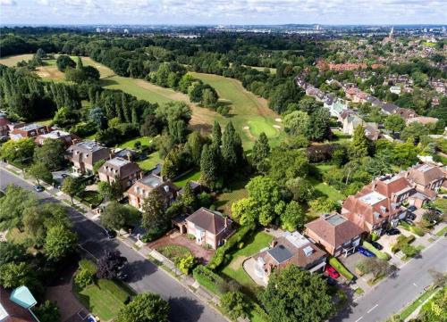 an overhead view of a house in a suburb at The Hidden Cottage in London