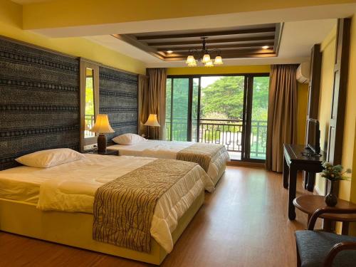 Postel nebo postele na pokoji v ubytování Quinstel Guesthouse