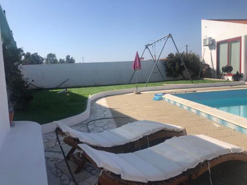 A piscina em ou perto de CASA ROSA COSY PINK GUEST HOUSE