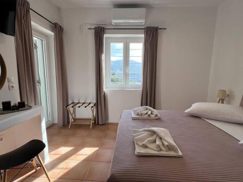 Postel nebo postele na pokoji v ubytování Krios Guesthouse