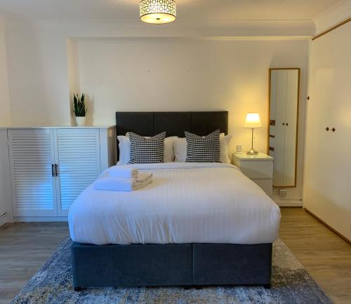 Voodi või voodid majutusasutuse Marlyn Lodge – City of London toas