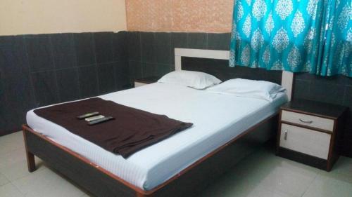 Posteľ alebo postele v izbe v ubytovaní Sahara hotel