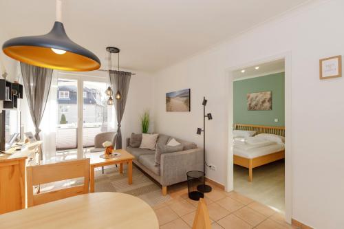 Postel nebo postele na pokoji v ubytování Apartment-Residenz Ostseestrand Apartment-Residenz Ostseestrand 21