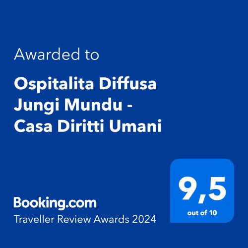 un cartello blu che dice aggiudicato all'ospritica difficoltà juxtinator di Ospitalita Diffusa Jungi Mundu - Casa Diritti Umani a Camini