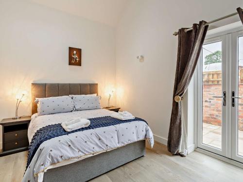 Ένα ή περισσότερα κρεβάτια σε δωμάτιο στο 2 Bed in Wintersett 93235