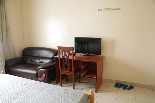 Kigali guesthouse: shared property with individual rooms