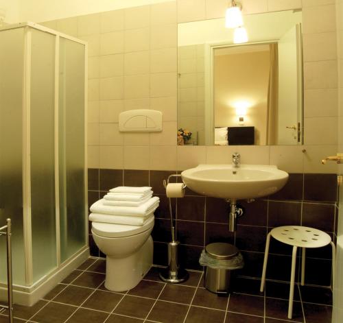 a bathroom with a toilet and a sink at Bella Cagliari B&B in Cagliari