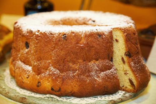 a cake sitting on a plate on a table at Terme Zreče – Vile Terme Zreče in Zreče