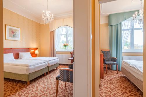 Katil atau katil-katil dalam bilik di Spa Resort PAWLIK-AQUAFORUM