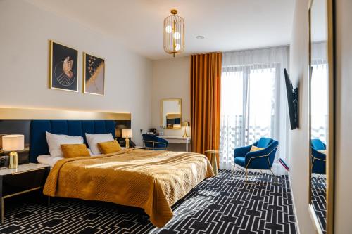 Postel nebo postele na pokoji v ubytování MODERNO hotel Garwolin