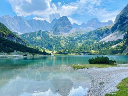 a view of a river with mountains in the background at Haus Tirol Ehrwald in Ehrwald