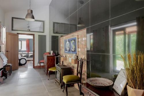 a living room with a table and chairs at Yellowrush Lodge @ Yellowtop in Selby