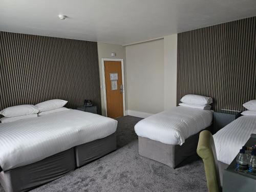 Кровать или кровати в номере The Townhouse Chester