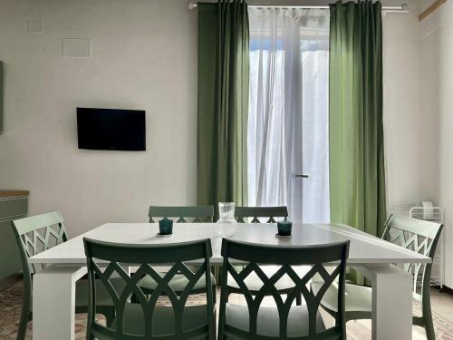 Телевизор и/или развлекательный центр в M'AMA apartment