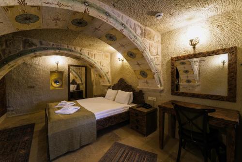 Un ou plusieurs lits dans un hébergement de l'établissement Capp Royal Cave HOTEL