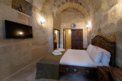 Un ou plusieurs lits dans un hébergement de l'établissement Capp Royal Cave HOTEL