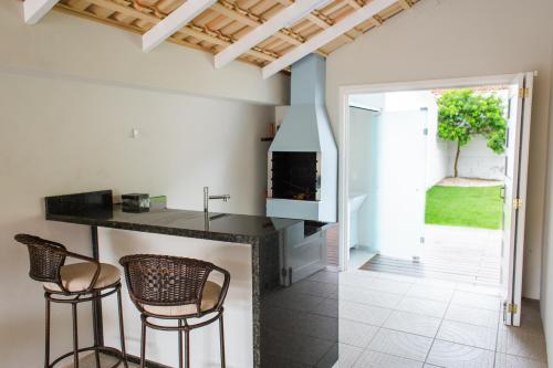 TV a/nebo společenská místnost v ubytování Prainha Beach House