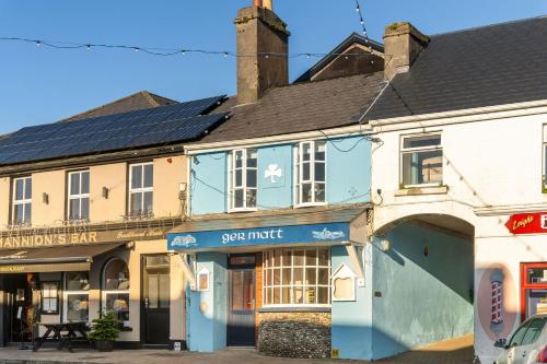 a building with solar panels on top of it at Property 444 - Clifden in Clifden