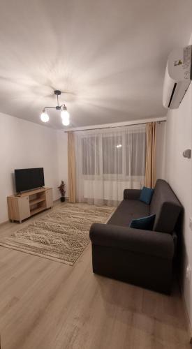 Televisyen dan/atau pusat hiburan di Comodo Apartment
