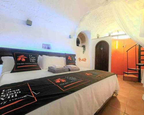 En eller flere senge i et værelse på La Casa Siglo Ocho