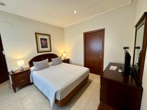 Katil atau katil-katil dalam bilik di Hotel Kazar