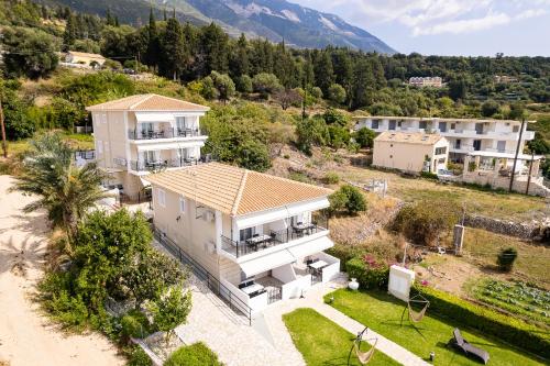 an aerial view of a house with a mountain at Barefoot Contessa in Lourdhata