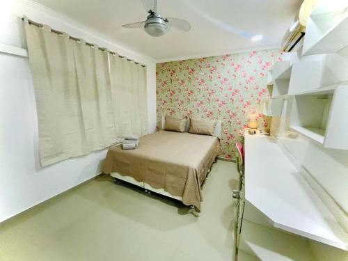 Katil atau katil-katil dalam bilik di Hospedagem Caminho das Praias