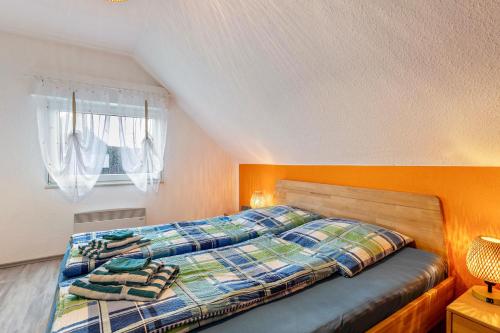 Postel nebo postele na pokoji v ubytování Ferienhaus Wind und Wolke