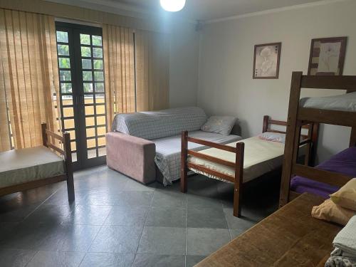a room with two bunk beds and a chair at Lu in Itu