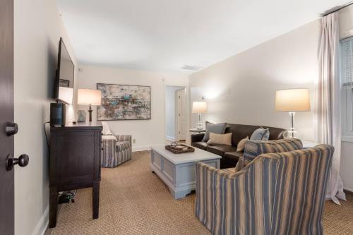 a living room with a couch and a table at Discover Decatur in Decatur