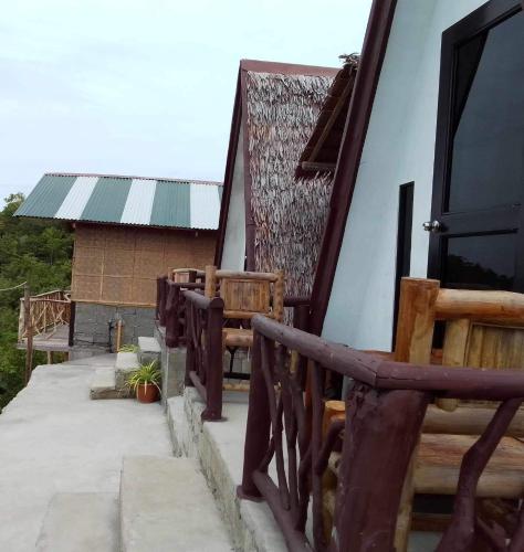 Balkón nebo terasa v ubytování Thornton's Sea View Cafe & Guesthouse