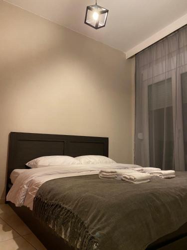 Postel nebo postele na pokoji v ubytování R&K MODERN APARTMENT