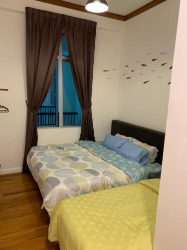 Ένα ή περισσότερα κρεβάτια σε δωμάτιο στο HappyHomestay
