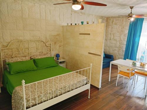 Ένα ή περισσότερα κρεβάτια σε δωμάτιο στο Villa 4 Posti Letto 100 Metri Dal Mare