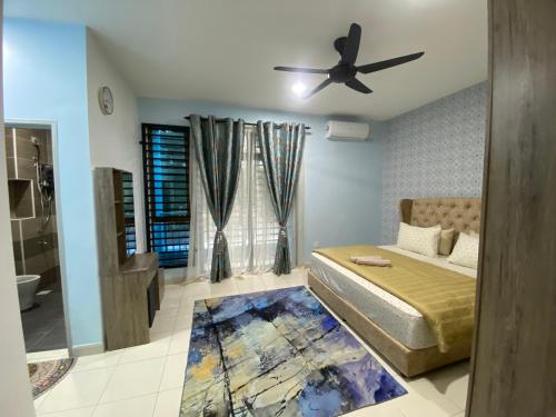a bedroom with a bed and a ceiling fan at DD Homestay Pasir Gudang in Pasir Gudang