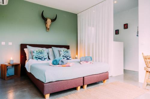 Ένα ή περισσότερα κρεβάτια σε δωμάτιο στο Bohemi Design Villa's