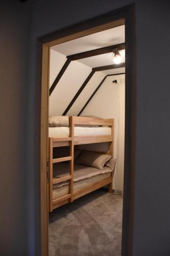 a closet with bunk beds in a room at Villa Šola in Kupres