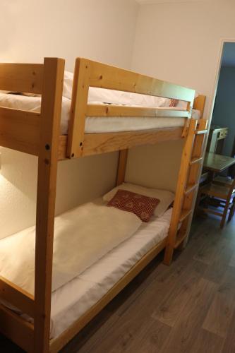 a couple of bunk beds in a room at Résidence Azureva La Clusaz les Aravis in La Clusaz