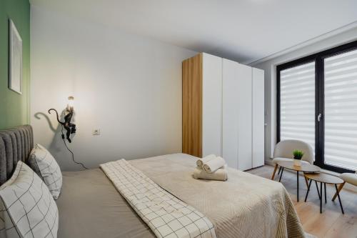Ліжко або ліжка в номері Golden Apartments Warsaw&Towarowa
