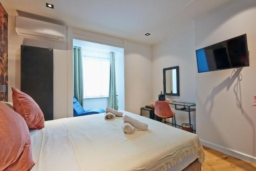 TV a/nebo společenská místnost v ubytování Hotel Les Ecrins
