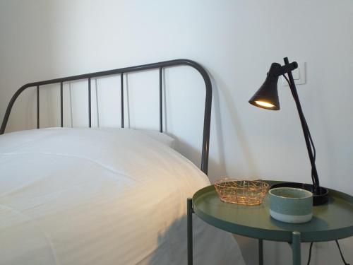 En eller flere senge i et værelse på Alizée